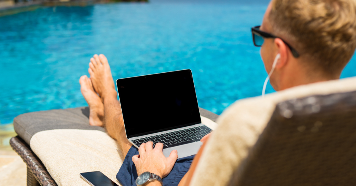 laptop by the pool