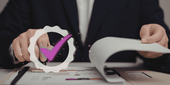 Professional reviewing tax documents to ensure compliance with HMRC residency requirements.